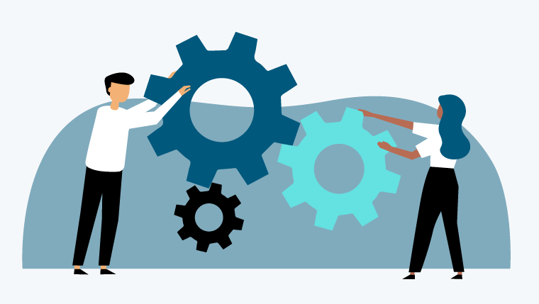  Människor snurrar stora växlar. 